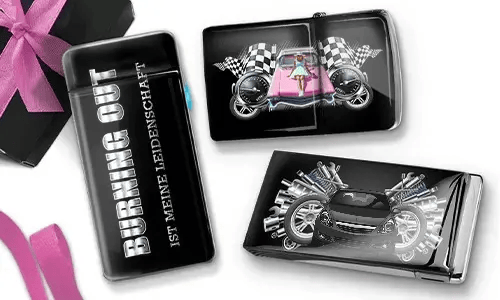 A decorative lighter and two cases featuring racing themes. One lighter reads 