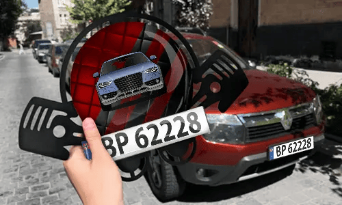 Autoschlüsselanhänger in der Hand mit dem Kennzeichen auto schlüsselanhänger gravur