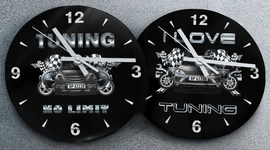 Two racing-themed wall clocks: left with black car and TUNING NO LIMIT text, right with blue car and MOVE TUNING text